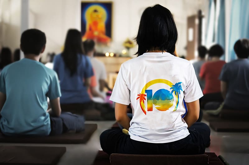 group of people meditate